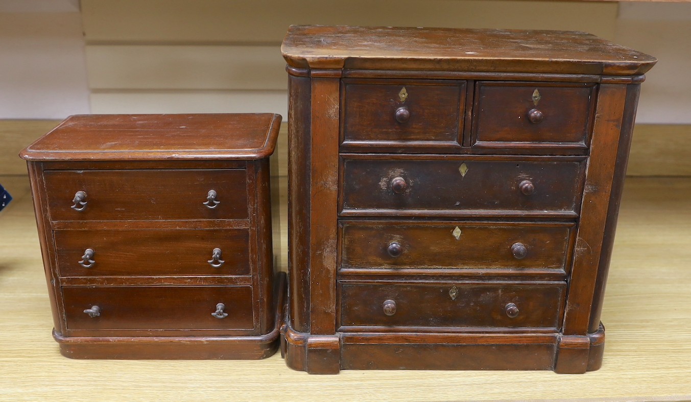 Two Victorian mahogany table top miniature chests of drawers, largest 39 cms wide x 38 cms high.